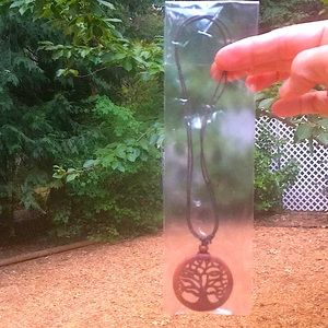 Free People Tree of life necklace, wood carving